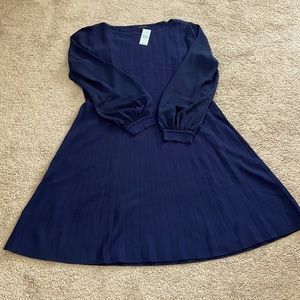 Pleated blue sweater dress with flowy sleeves